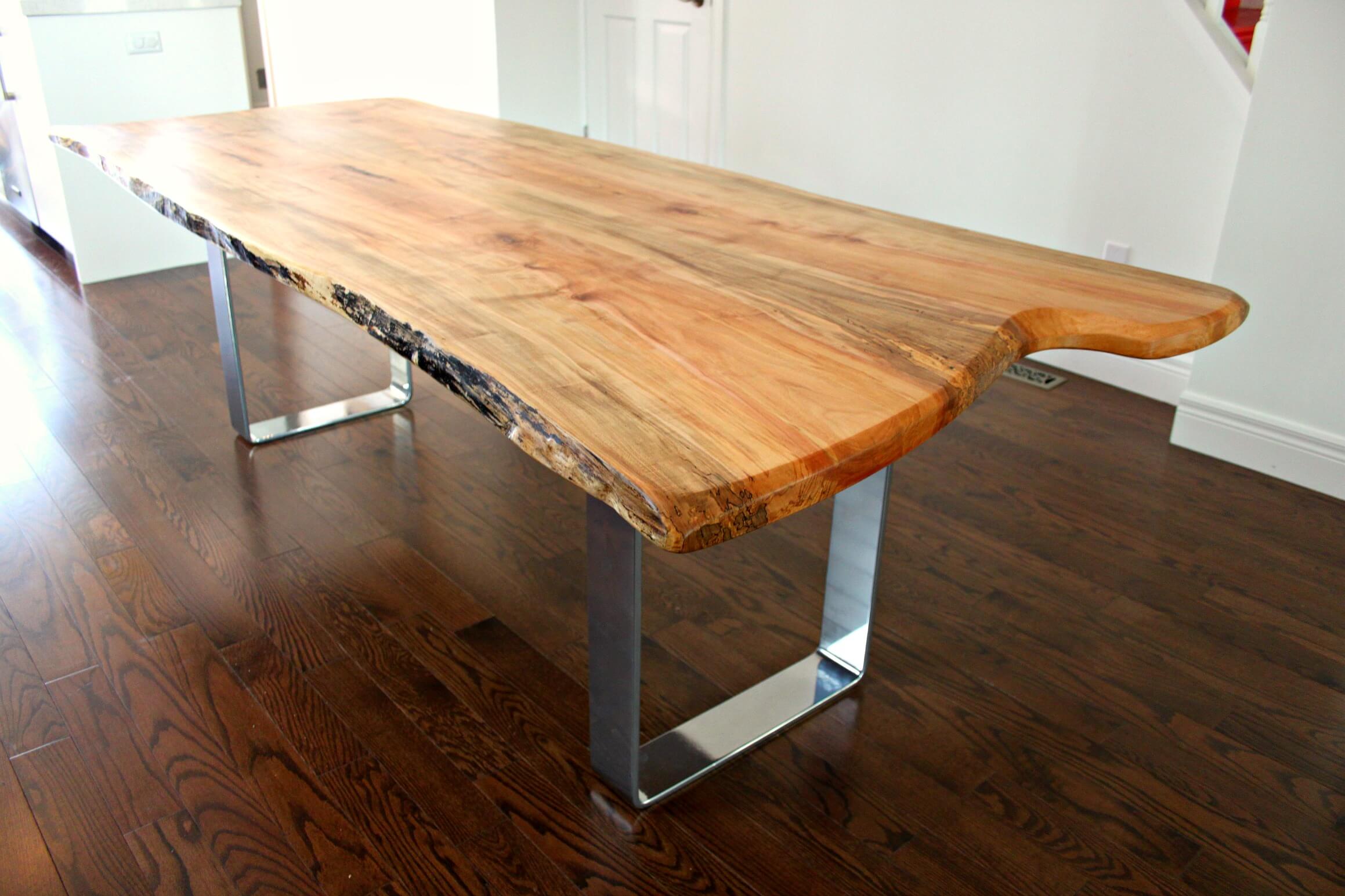 Live edge maple table with modern chrome 'u' base